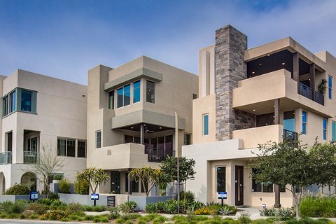 Modern style condominiums with brick chimney