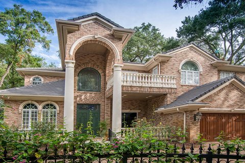 Two story Mediterranean style brick home
