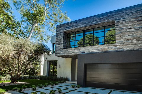 Modern home with stone façade