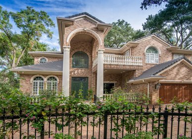 Two story Mediterranean style brick home