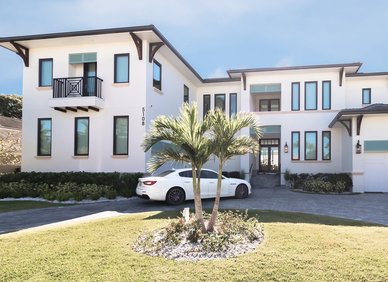 White modern two story home