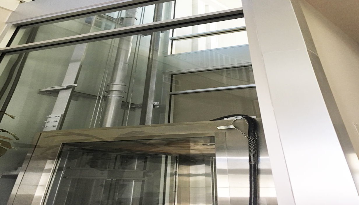 Crystal Clear: The Allure and Safety of Glass Elevators in Residential Homes
