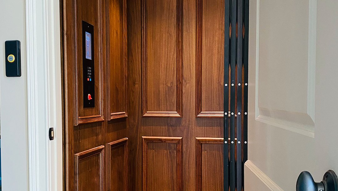 Home elevator with beautiful wood paneling